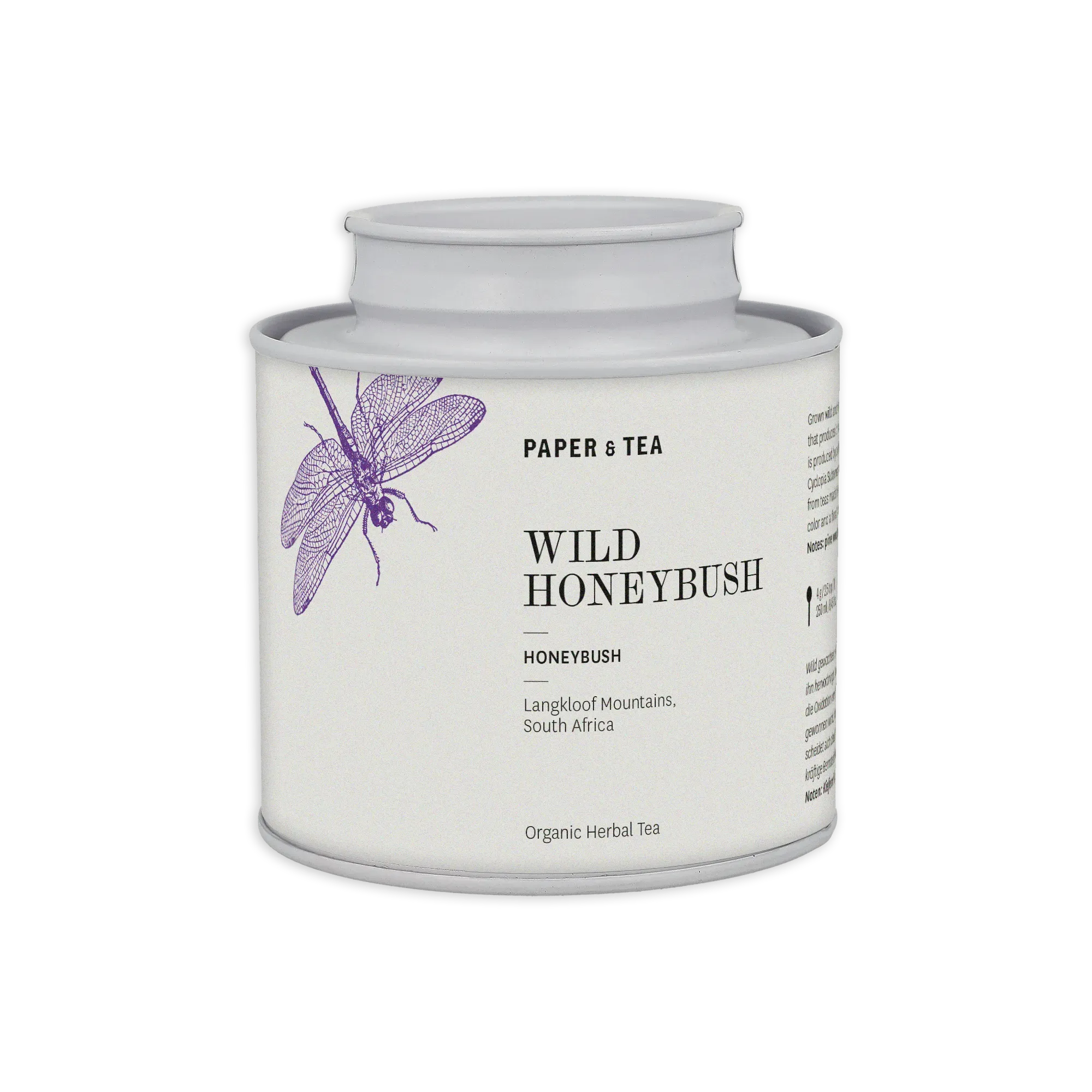 Weiße zylindrische Teedose mit Libellenmotiv, enthält PAPER & TEA Wild Honeybush Bio-Kräutertee.